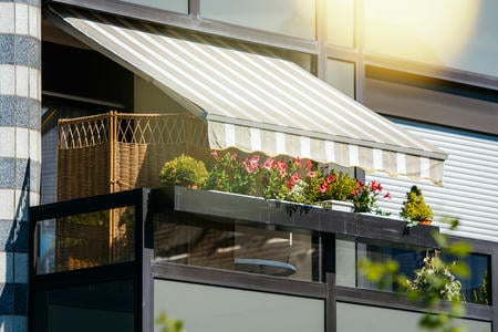 Fabric vs. Metal Awnings: How Cleaning Methods Differ and Why It Matters